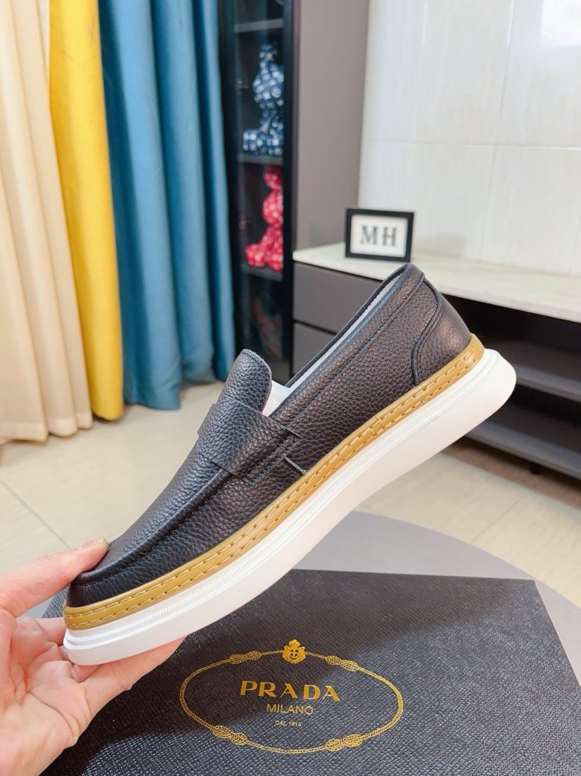 Prada Textured Slip-On Shoes